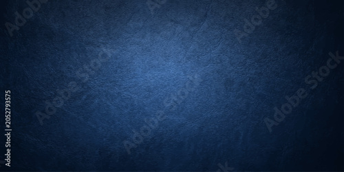 Bild auf Leinwand A dark blue, textured background with subtle grunge elements creates a moody and sophisticated backdrop, perfect for design projects needing a touch of depth and mystery