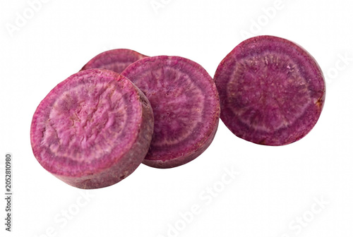 Konstfotografi Fresh Slices of Vibrant Purple Sweet Potato