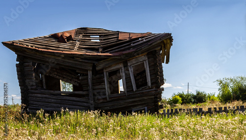 Photos Abandoned wooden house in rural Russian village landscape during summer