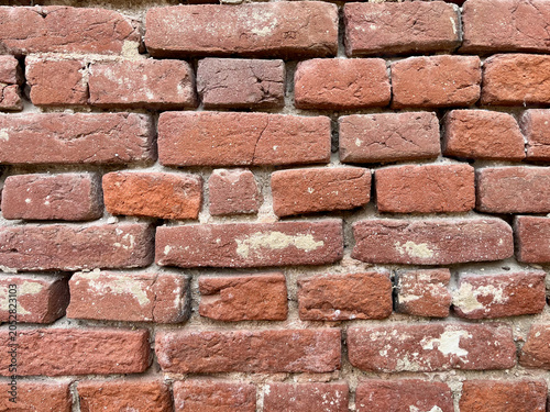 Old red brick wall texture background with vintage masonry pattern