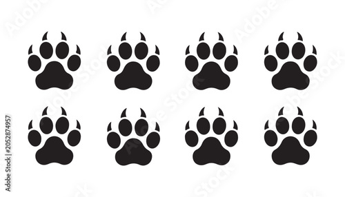 Animal paw print icons set with claws for wildlife tracking isolated on transparent grid background.