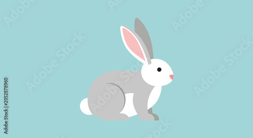 фотографія Cute Grey and White Rabbit Sitting.