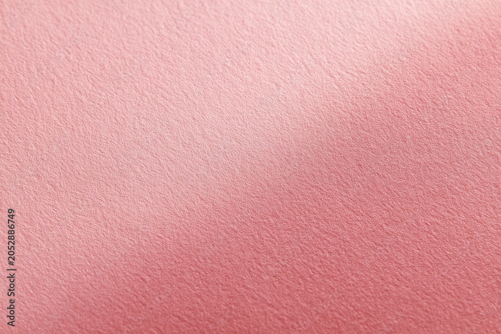 Fototapeta premium Gentle pink gradient background with subtle texture for branding and photography