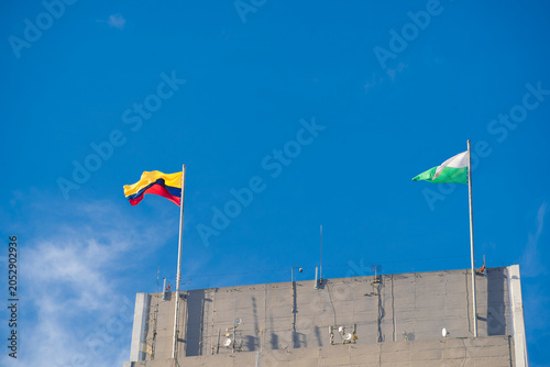 Flag of Antioquia and Colombia waving