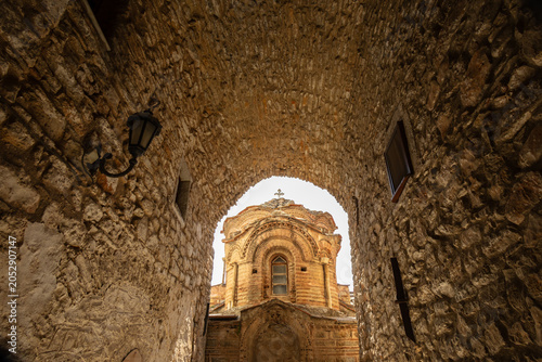 Byzantine church of Agioi Apostoloi with traditional brickwork in Pyrgi, Chios island, Greece