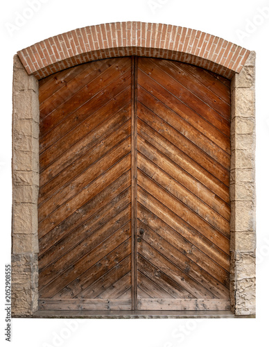 Antique double wooden door with diagonal planks, set within rustic stone frame and brick arch. Isolated, perfect for architectural visualization, photo manipulation, and historical design