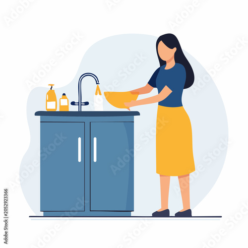 Woman washing dishes at a kitchen sink