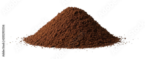 Premium rich pile of aromatic dark ground coffee with a coarse texture isolated transparent background image