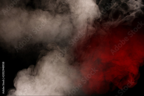 Orange and red steam on a black background.
