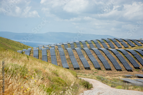 Rows Of Photovoltaic Solar Panels On A Rural Hillside Turkey