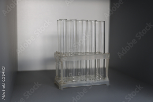Clean laboratory test tubes ready for scientific experiments and chemical analysis. Laboratory equipment concept for biotechnology research, healthcare diagnostics and scientific testing.