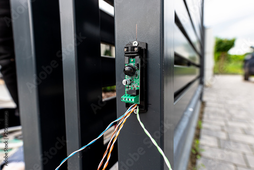 Photography Photocell sensor installation for automatic sliding gate security