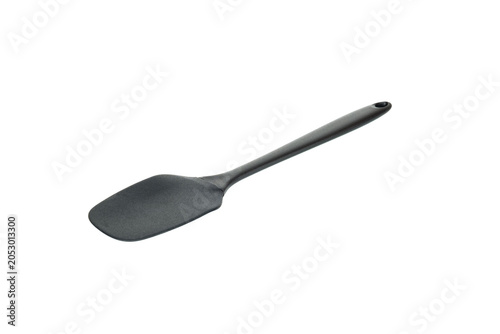 black pastry spatula made of silicone on an isolated white background