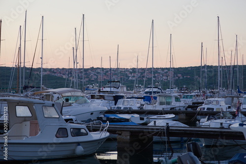 Boats and Yachts in Punat Harbor at Sunset