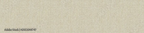 Photos Detailed view of a beige herringbone fabric texture background with classic zig zag woven wool or linen material patterns