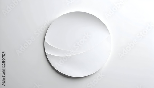 Minimalist, all-white circular design with subtle curves, casting gentle shadows