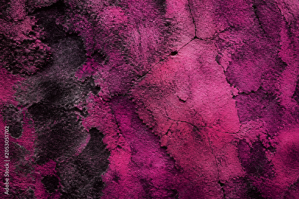 Naklejka premium Magenta paint peeling and cracked on rough wall surface