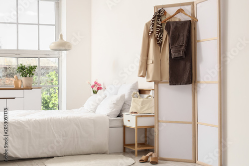 Interior of bedroom with be...