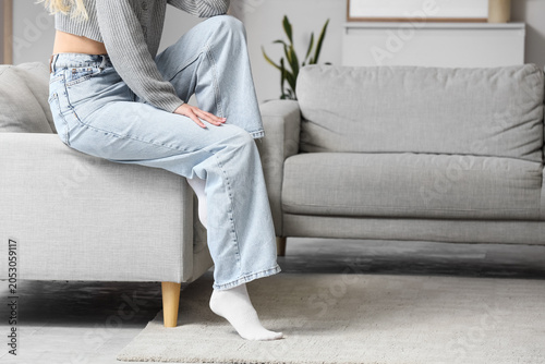 Young woman in stylish jean...