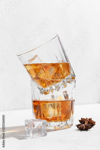 Stacked whiskey glasses wit...