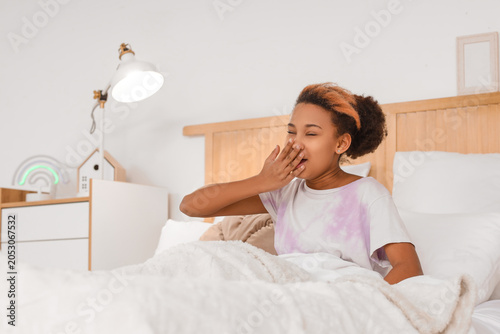 Sleepy teenage African-Amer...