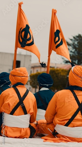 Indian religious festival of Vaisakhi, guards in orange uniforms