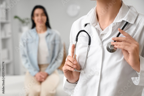 Female doctor with stethosc...