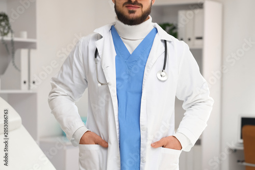 Male doctor with stethoscop...