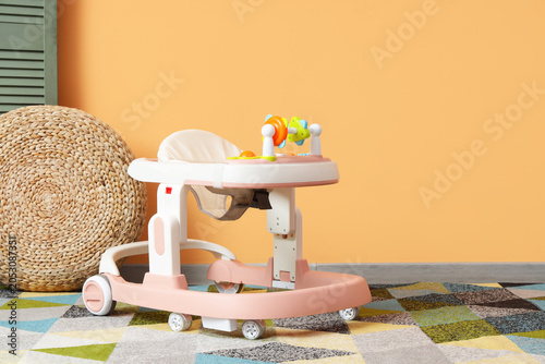 Baby walker with wicker pou...