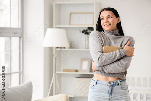 Beautiful young woman with ...