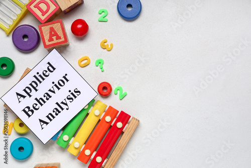 Tableau sur toile Applied behavior analysis with colorful educational toys and xylophone for child