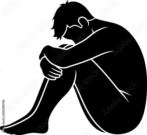 Foto Sad man sitting alone depressed.