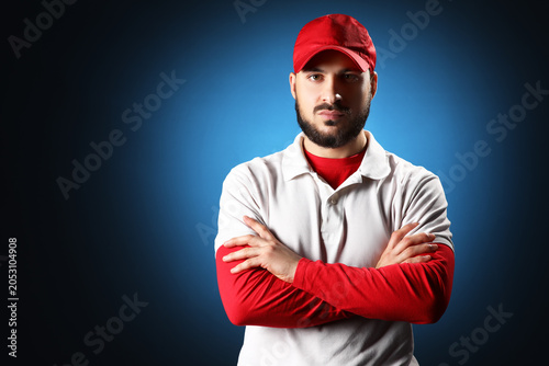Confident young man in red ...