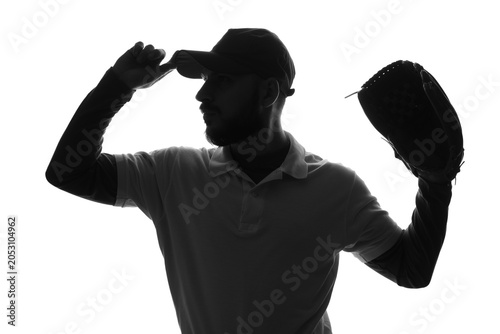 Foto Baseball player silhouette with cap and glove, sports and athletic competition,