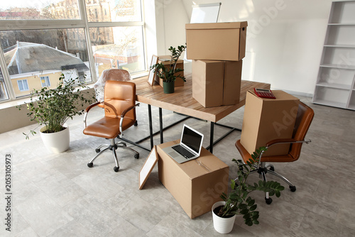 Empty office space with mov...