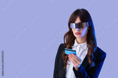 Young businesswoman in AR g...