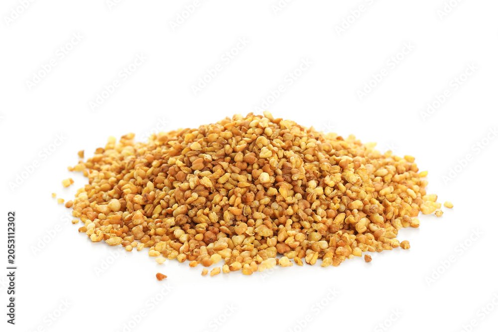 Fototapeta premium Heap of dry buckwheat tea isolated on white background, closeup