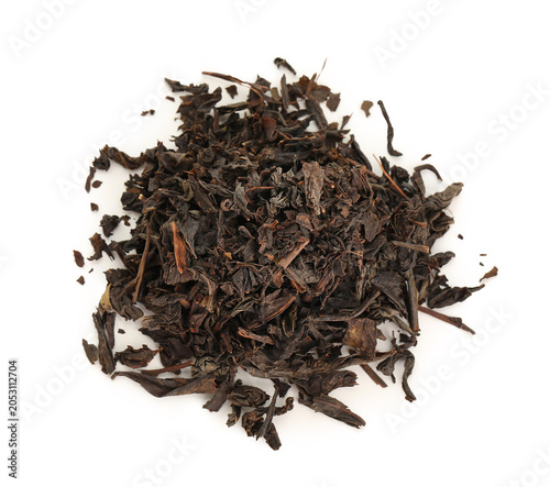 Heap of dry black tea leave...