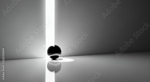 A solitary sphere bathed in a beam of light, creating a stark contrast in a minimalist setting.