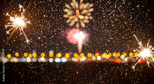 Sparkling Fireworks and Bokeh Lights at Night.