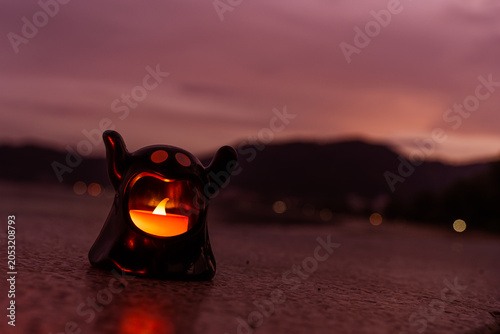 Concept: Halloween beach and ocean background with sea ghost with witch ghost fire, dark, scary tone.