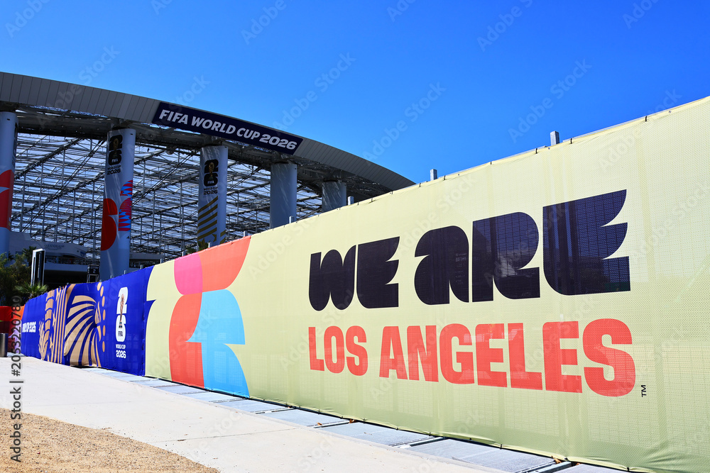 Naklejka premium Inglewood, Los Angeles County, California – June 9, 2026: FIFA World Cup 2026 event branding displayed outside SoFi Stadium in Inglewood, California 