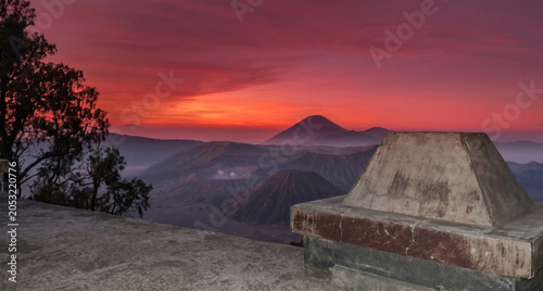 Schilderij op canvas A breathtaking high-altitude panoramic view at dawn or dusk, looking over a vast