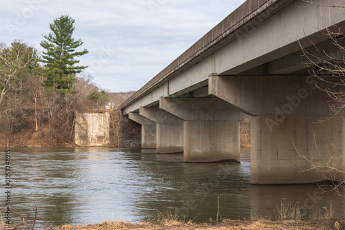 A bridge carrying State Route 62 over the Allegheny River in Warren County, Pennsylvania, USA on an overcast spring day