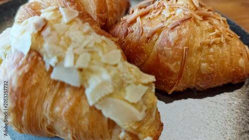 Schilderij op canvas Close-up of mini croissants on a plate