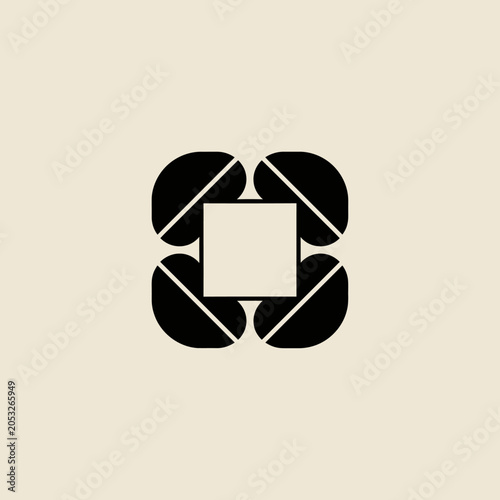 Photography Abstract geometric design with symmetrical black shapes around a central square