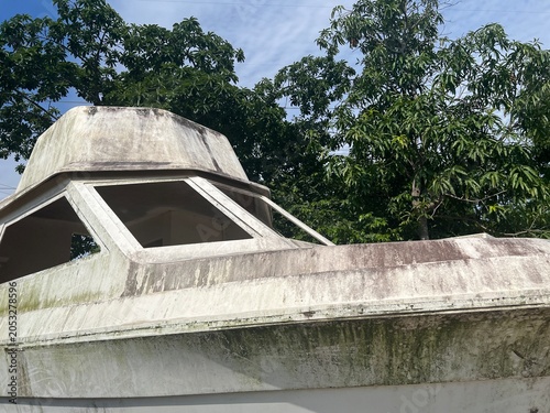 abandoned boat in nature garden