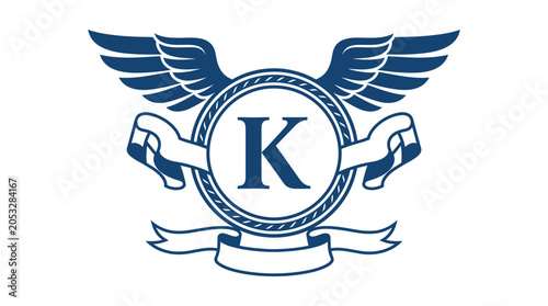 Konstfotografi Blue winged circular crest with letter K and ribbon.