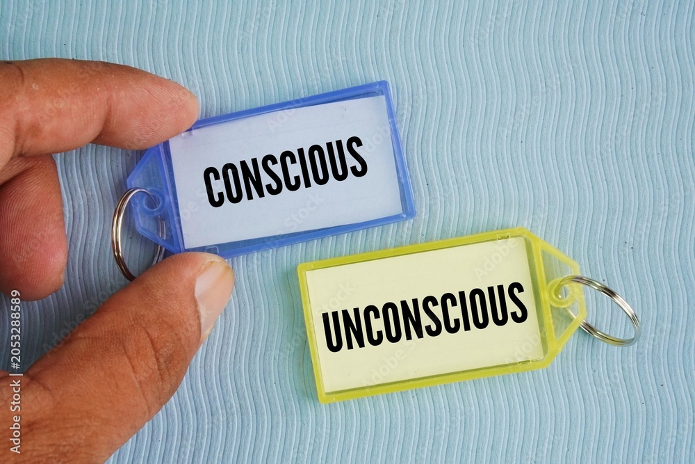 Fototapeta premium Tag with the words conscious or identity-driven habits and unconscious or hidden, automatic habits.