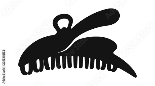 Black hair claw clip silhouette on dark background